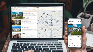 House with sold sign