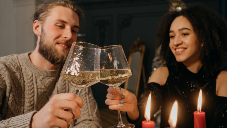 couple celebrating new year at home safe