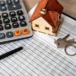 Money, pile coin with saving book and paper home,concept