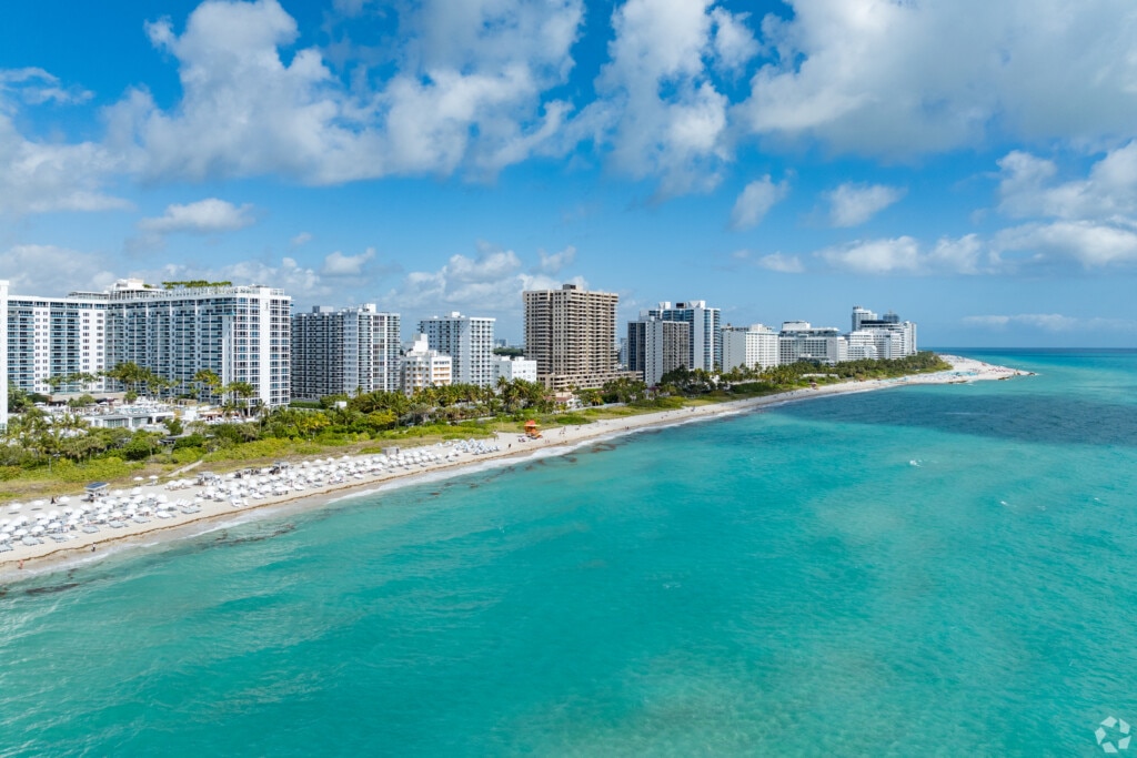 A view of beautiful clear water and the beachfront in Miami Beach.