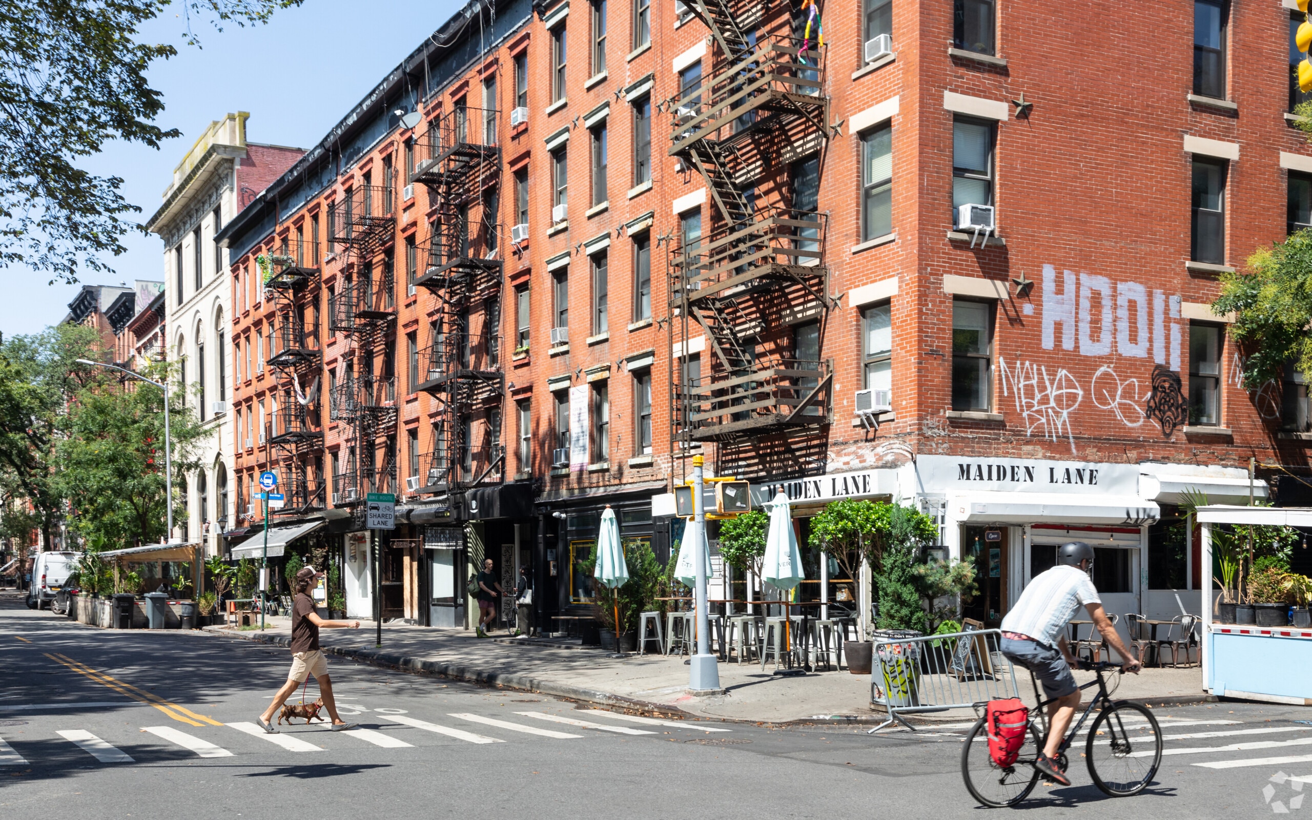 Alphabet City's iconic 5-story brick residences stand tall.